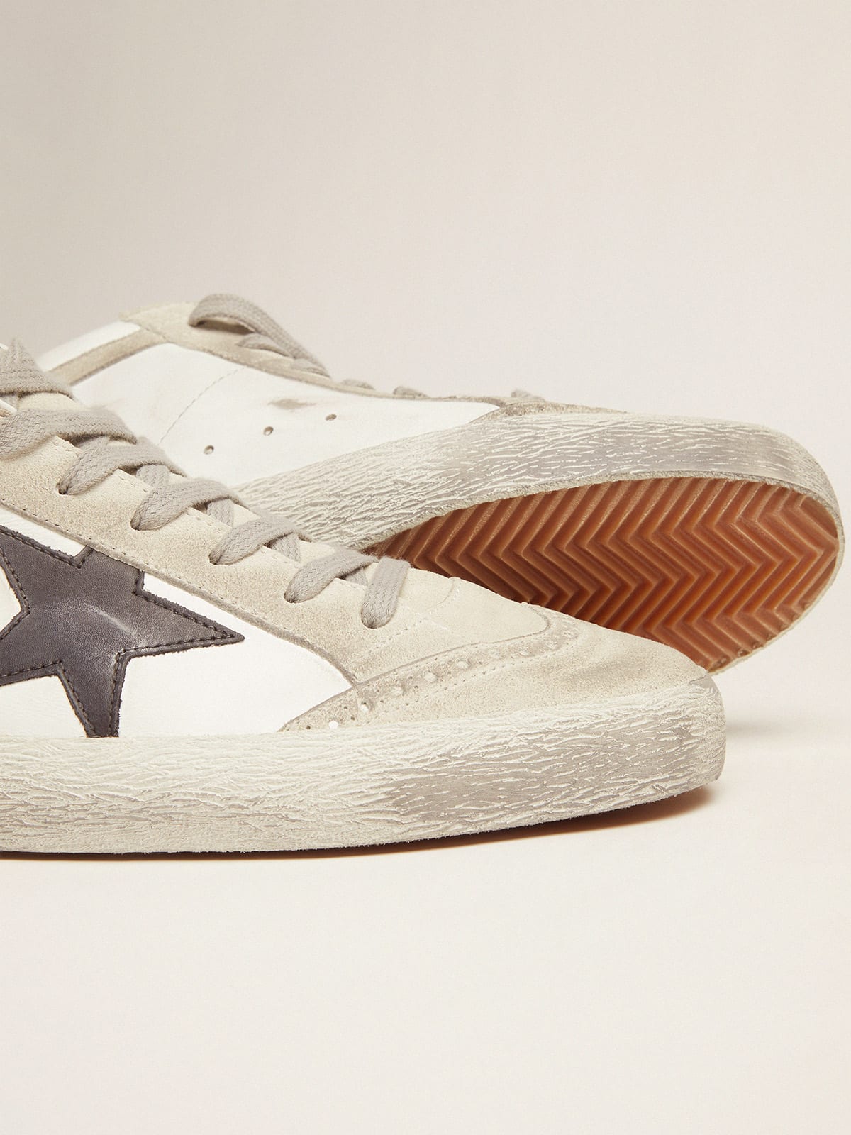 Golden goose sneakers on sale black and white