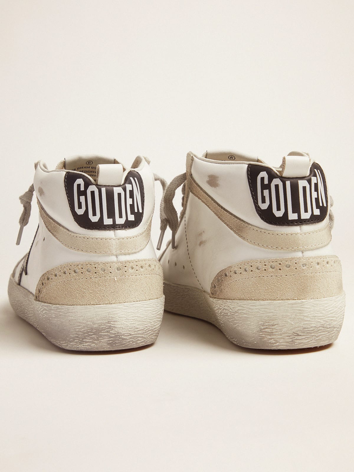 Golden Goose - Black and white Mid Star sneakers in 