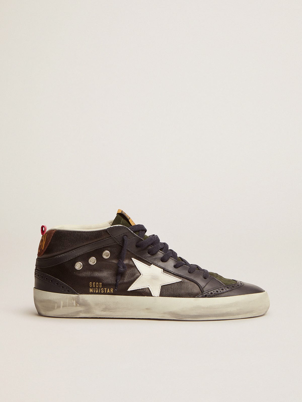 Zapatillas deportivas Mid Star de lona azul oscuro con estrella de