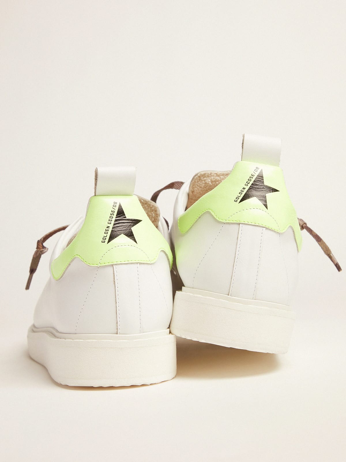 Golden Goose - White Starter LTD sneakers with fluorescent yellow heel tab in 