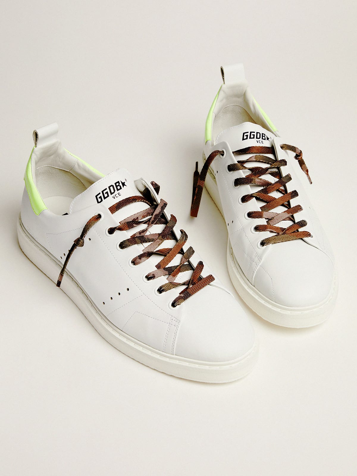 Golden Goose - White Starter LTD sneakers with fluorescent yellow heel tab in 
