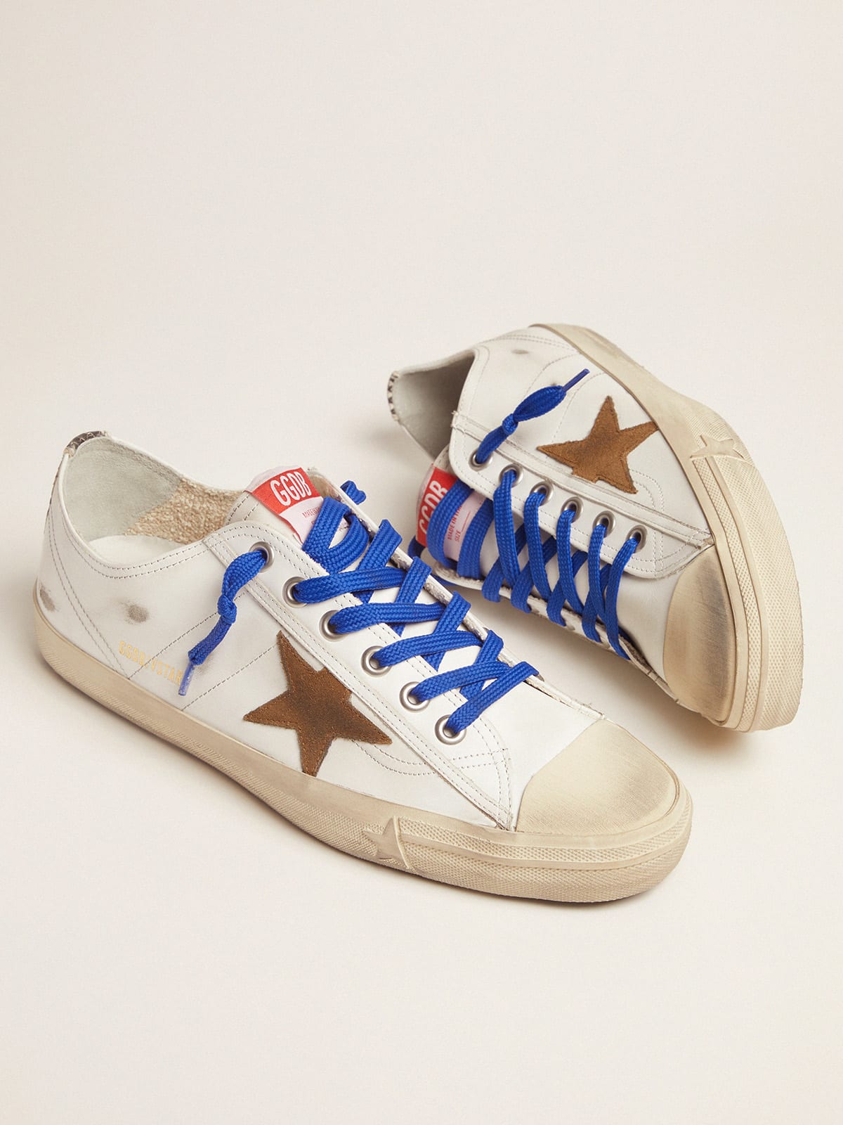 Golden Goose - V-Star sneakers LTD with snake-print vertical strip and blue laces in 