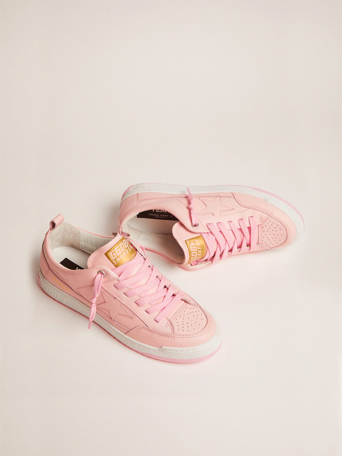 Adidas pink leather on sale shoes