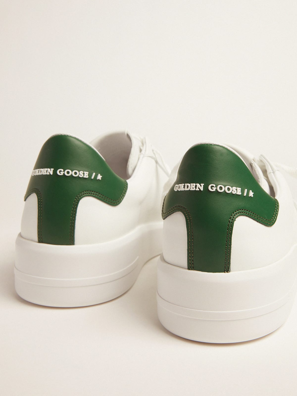 White Purestar sneakers with green heel tab | Golden Goose