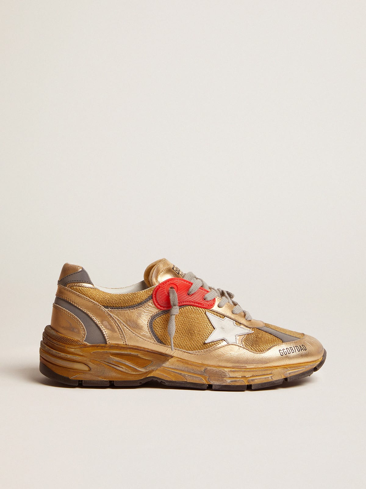 Gold Dad-Star sneakers with distressed finish