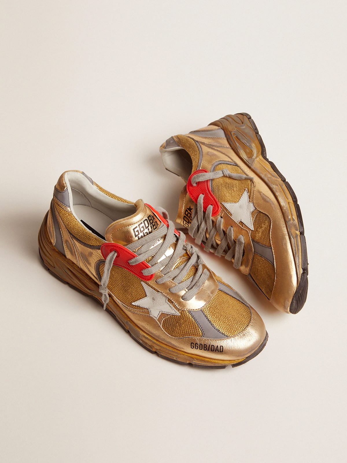 Men\'s Dad-Star gold with distressed finish | Golden Goose