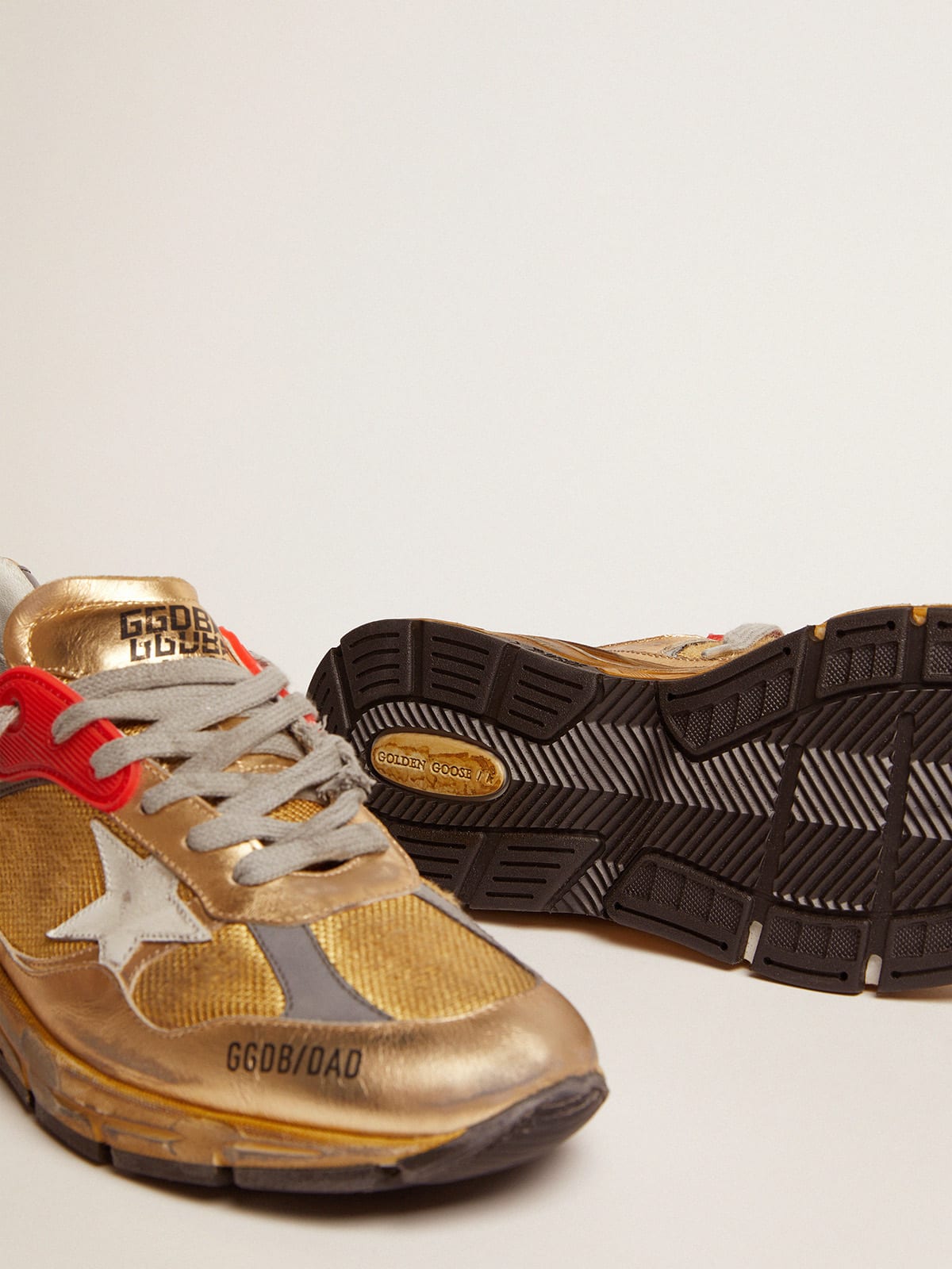 Golden Goose - Sneakers Dad-Star dorées avec finitions effet usé in 