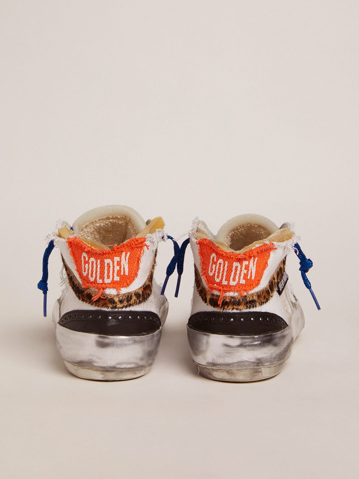 Golden Goose - Mid Star sneakers with white canvas upper and multi-foxing in 