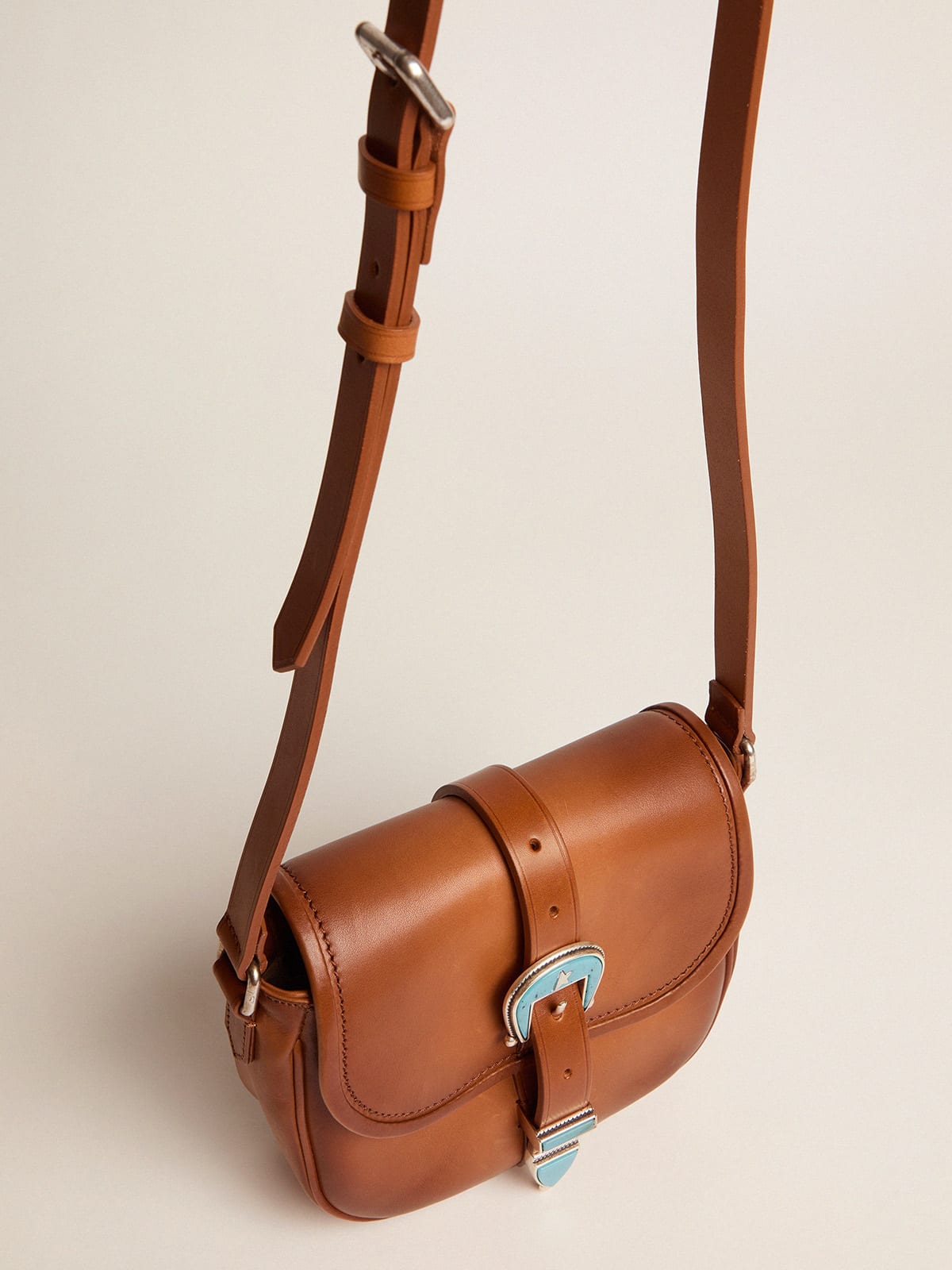 Small Rodeo Bag in pale tan leather with blue buckle Golden Goose