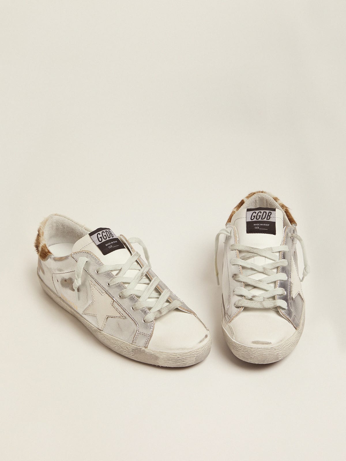 Laminated Super-Star sneakers with animal-print heel tab | Golden Goose