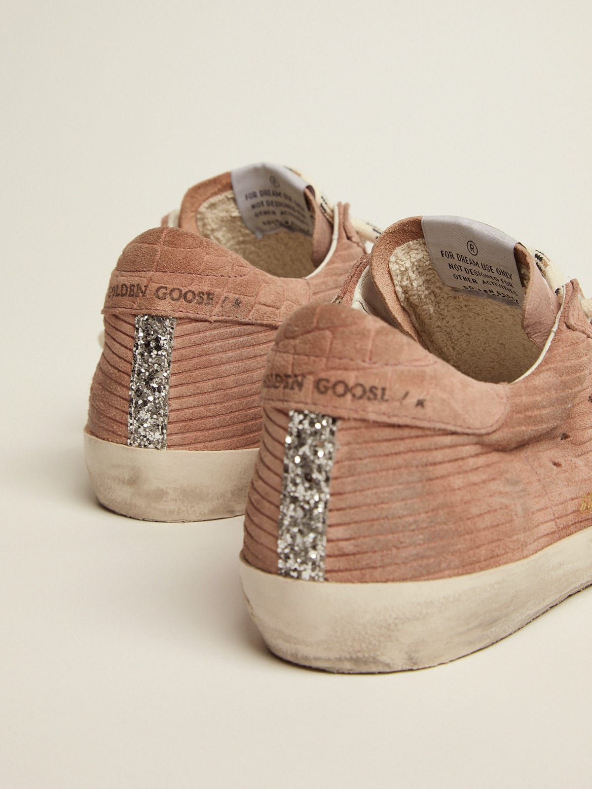 Golden goose pink 2025 suede skate superstar sneakers