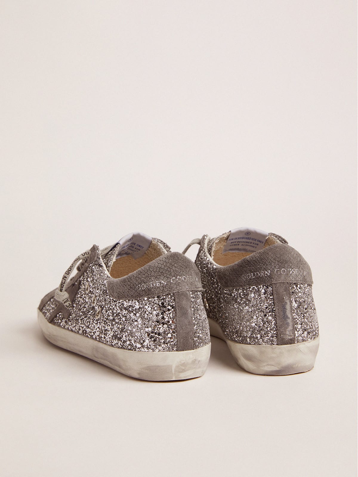 Super-Star sneakers in silver glitter and dark gray suede | Golden Goose