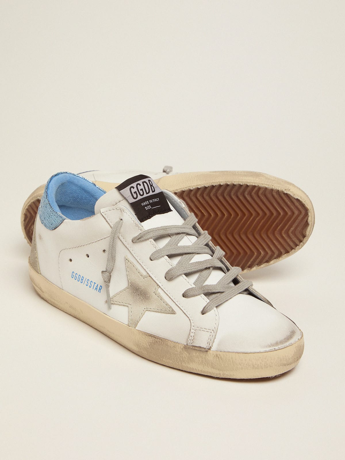 White Super-Star LTD sneakers with blue laminated heel tab | Golden Goose