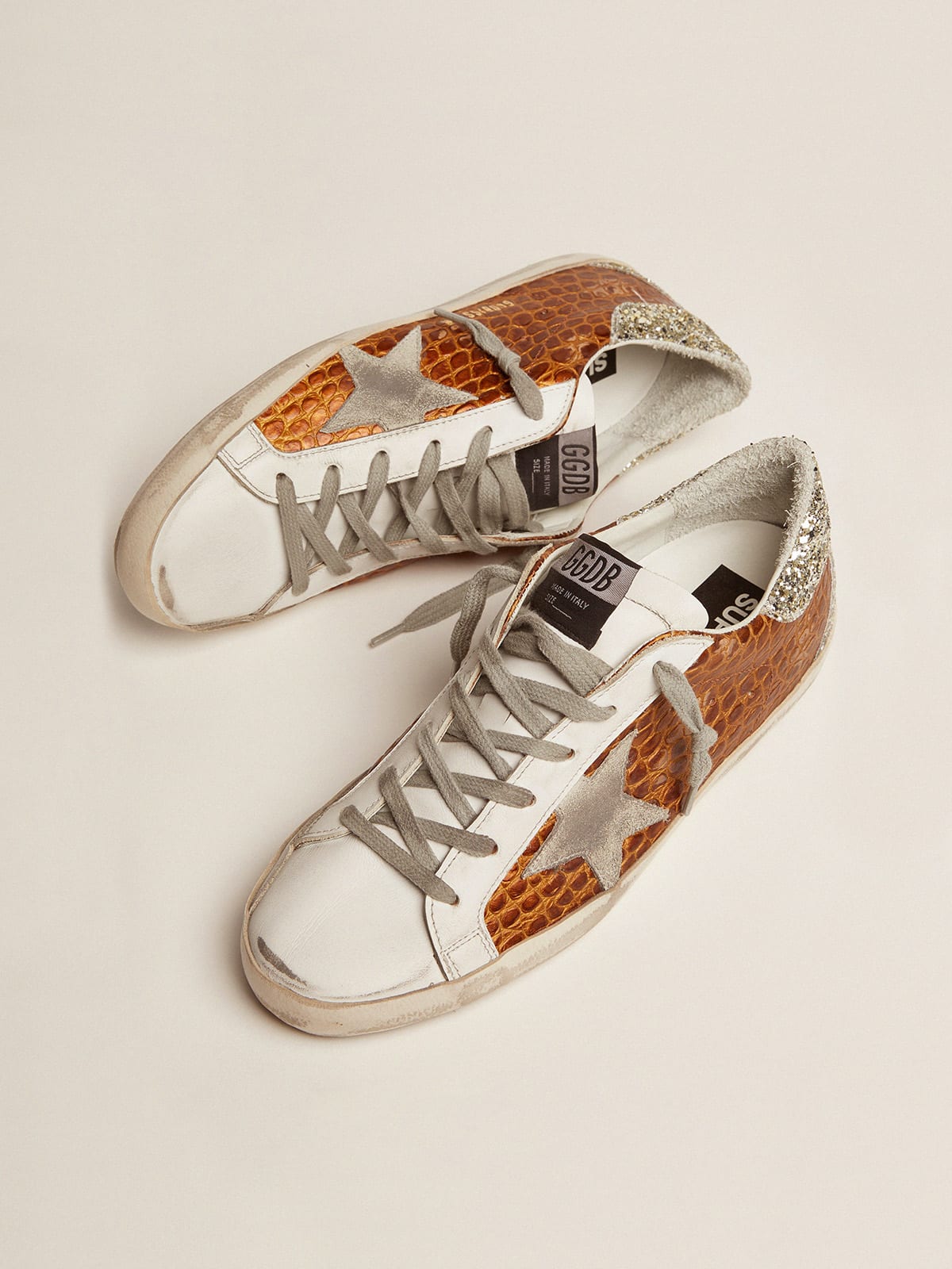 Super-Star sneakers in crocodile-print leather with light green glitter |  Golden Goose