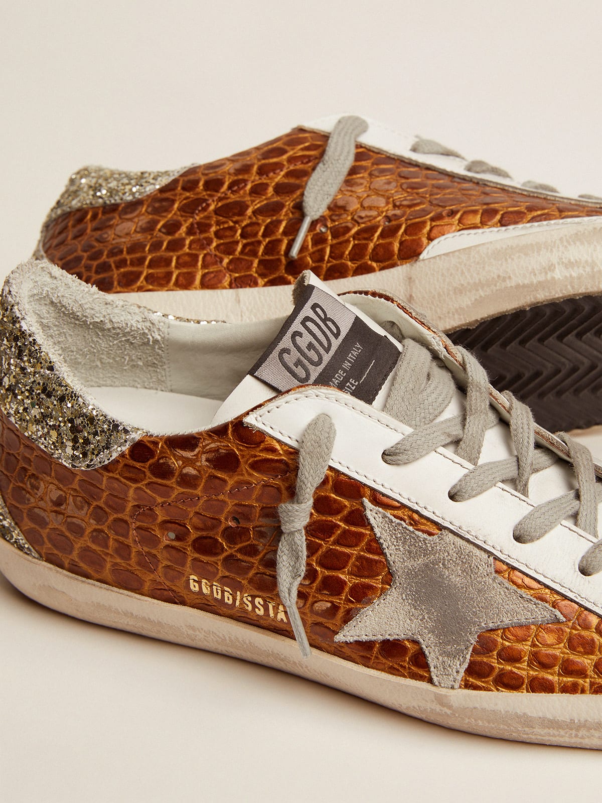 Super-Star sneakers in crocodile-print leather with light green glitter |  Golden Goose