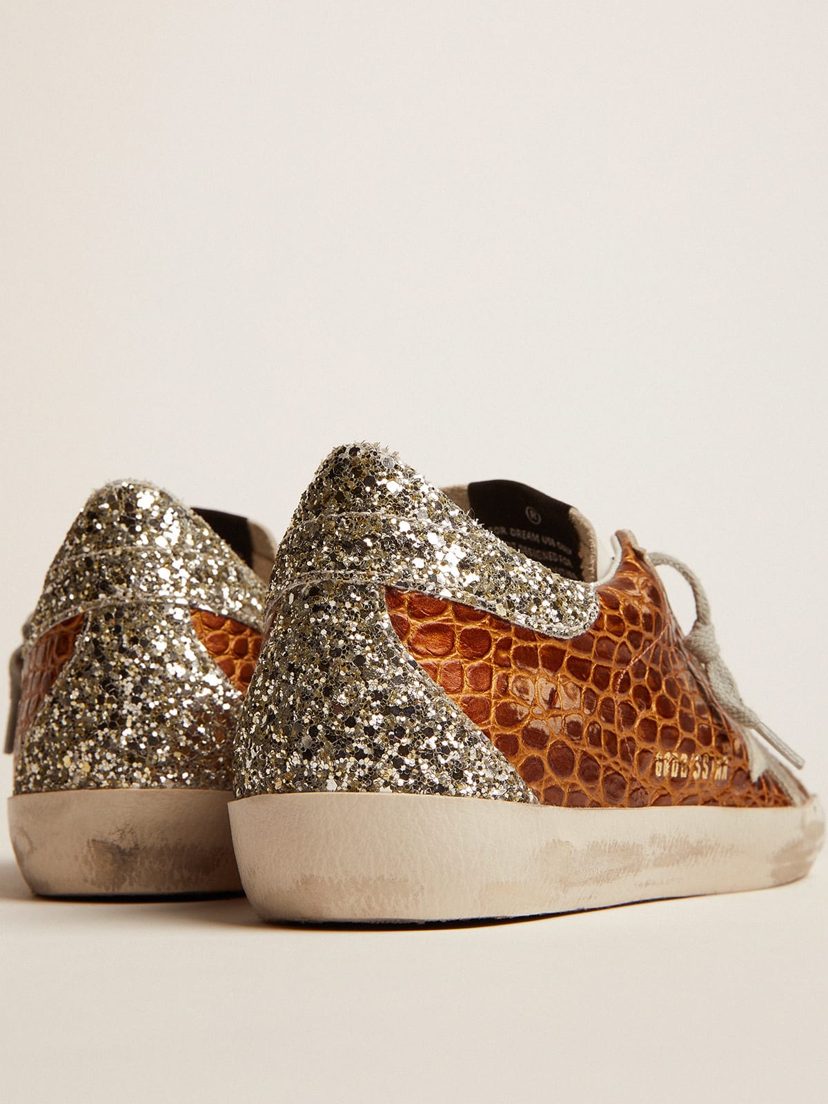 Super-Star sneakers in crocodile-print leather with light green glitter |  Golden Goose