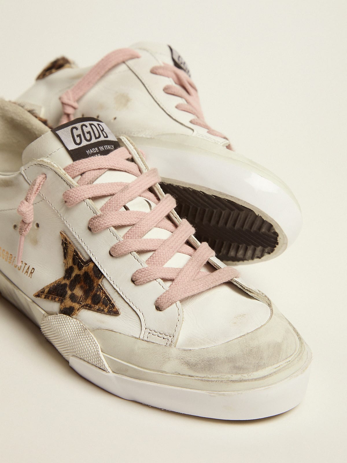 Super-Star sneakers in white leather with details and multi-foxing in  leopard-print pony skin | Golden Goose