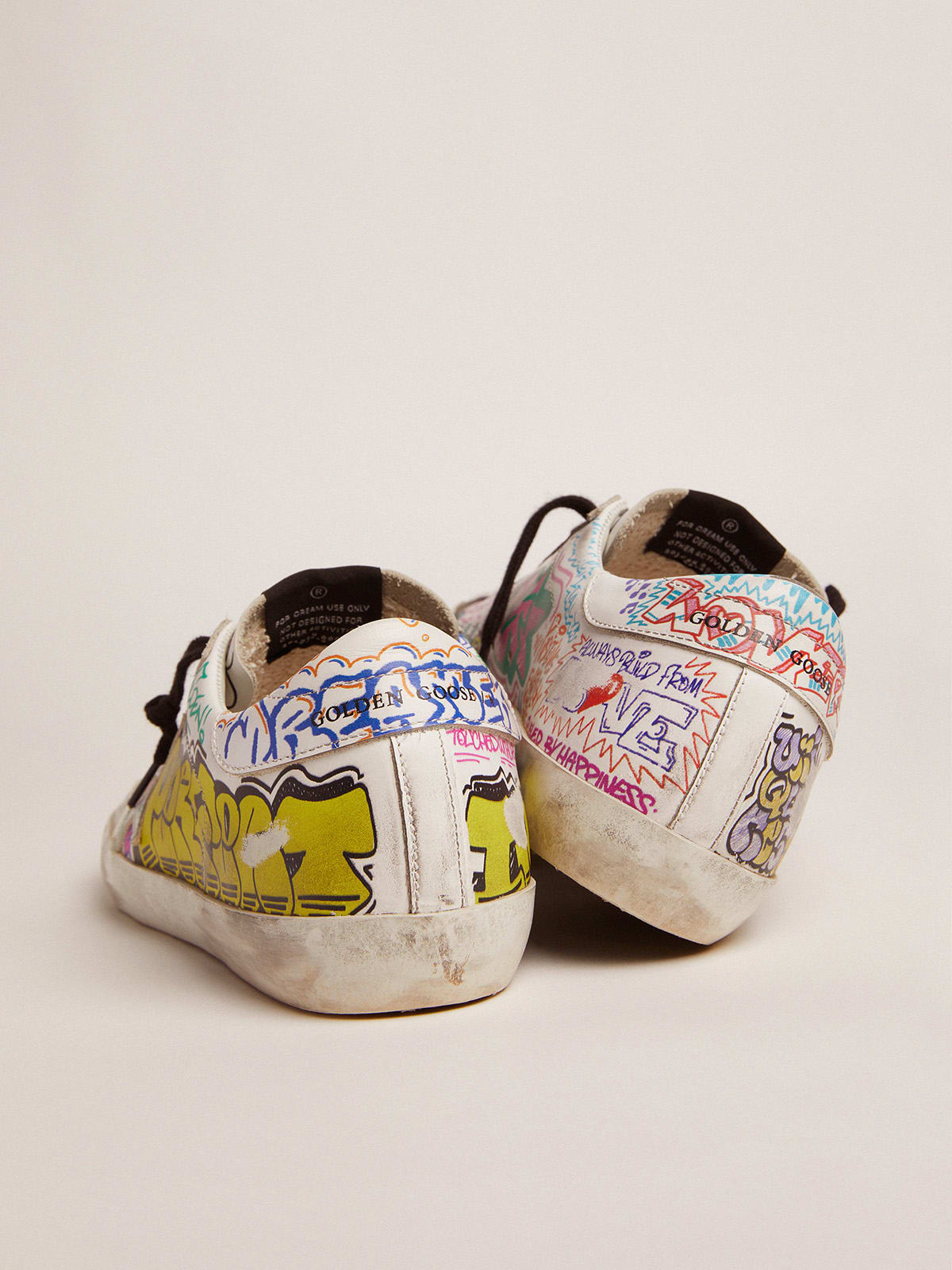 Super-Star sneakers in white leather with multicolored graffiti print |  Golden Goose