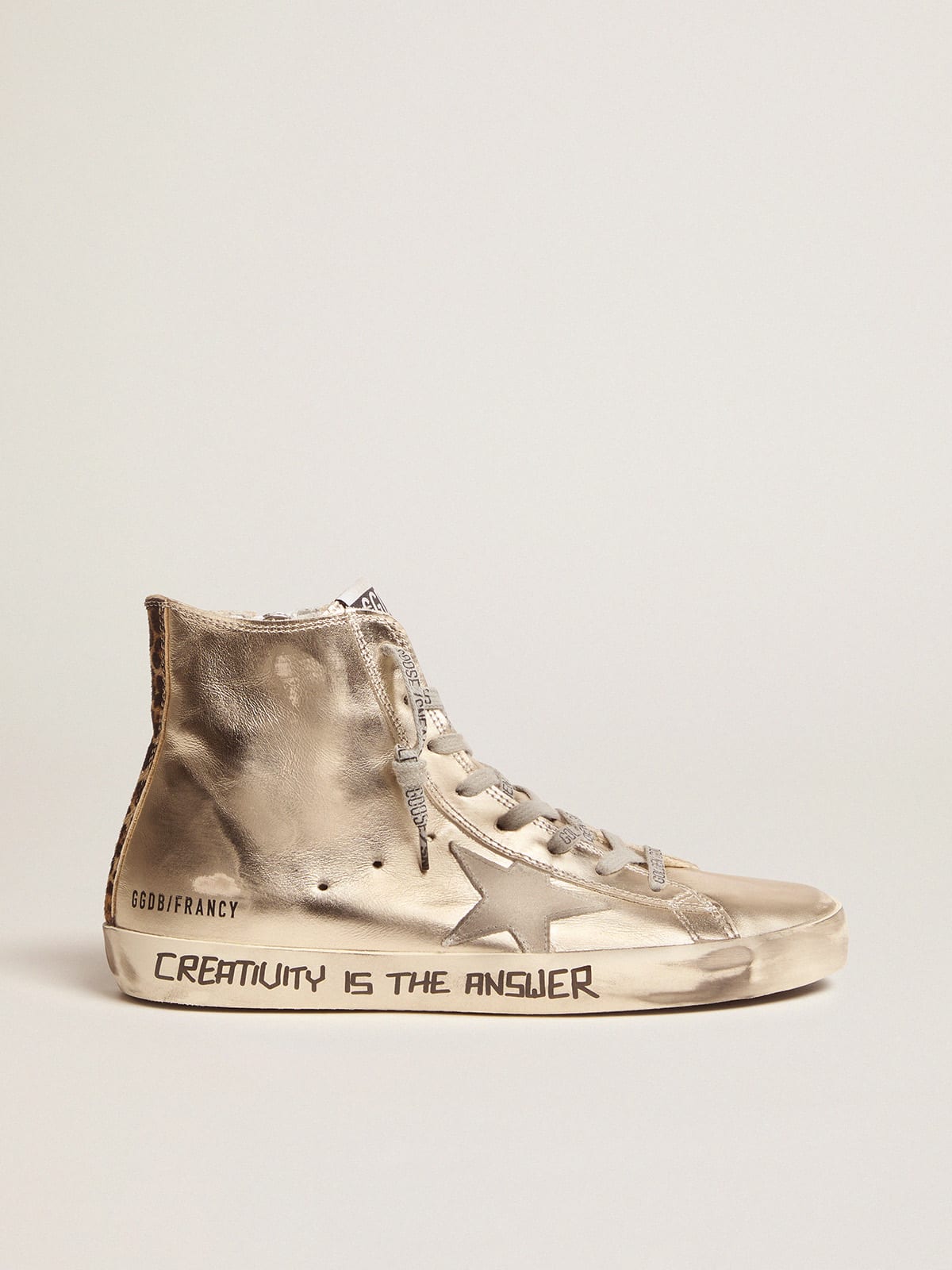 Gold Francy sneakers with handwritten lettering and leopard-print