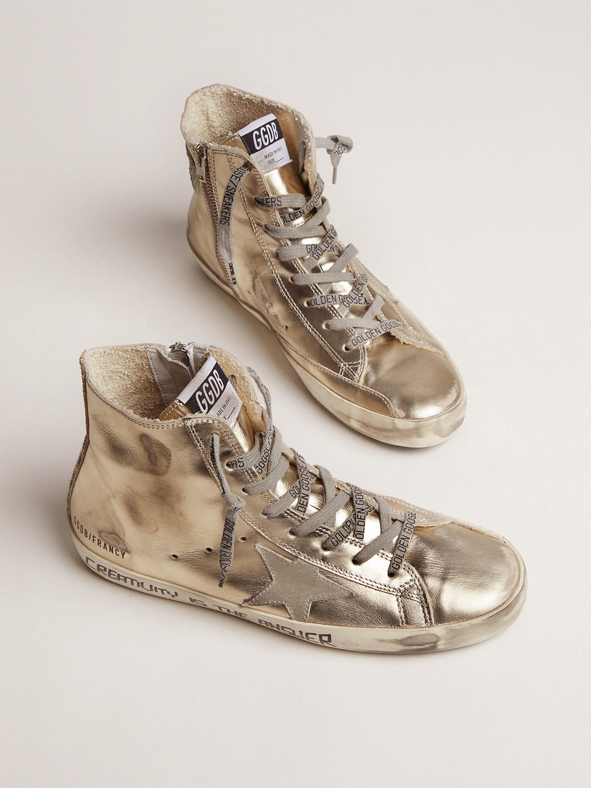 Gold Francy sneakers with handwritten lettering and leopard-print detail |  Golden Goose
