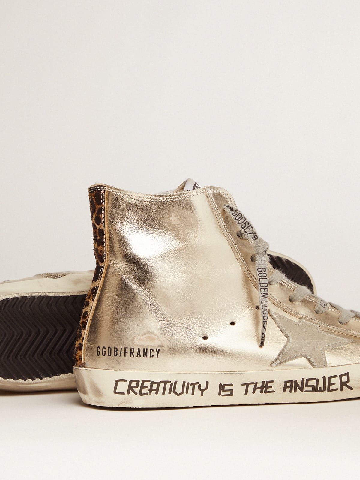 Gold Francy sneakers with handwritten lettering and leopard-print detail |  Golden Goose