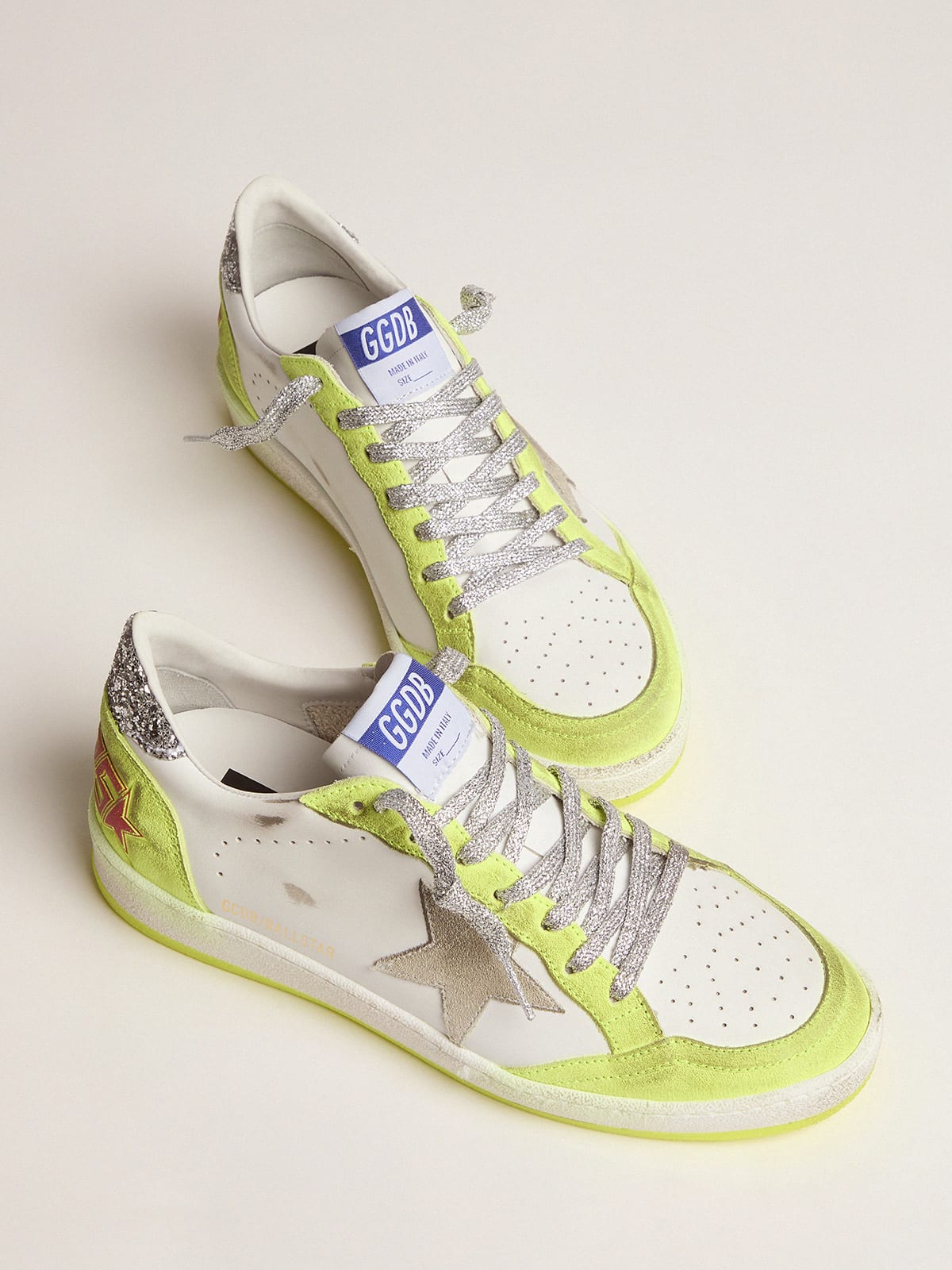 White Ball Star sneakers with fluorescent yellow inserts and glitter |  Golden Goose