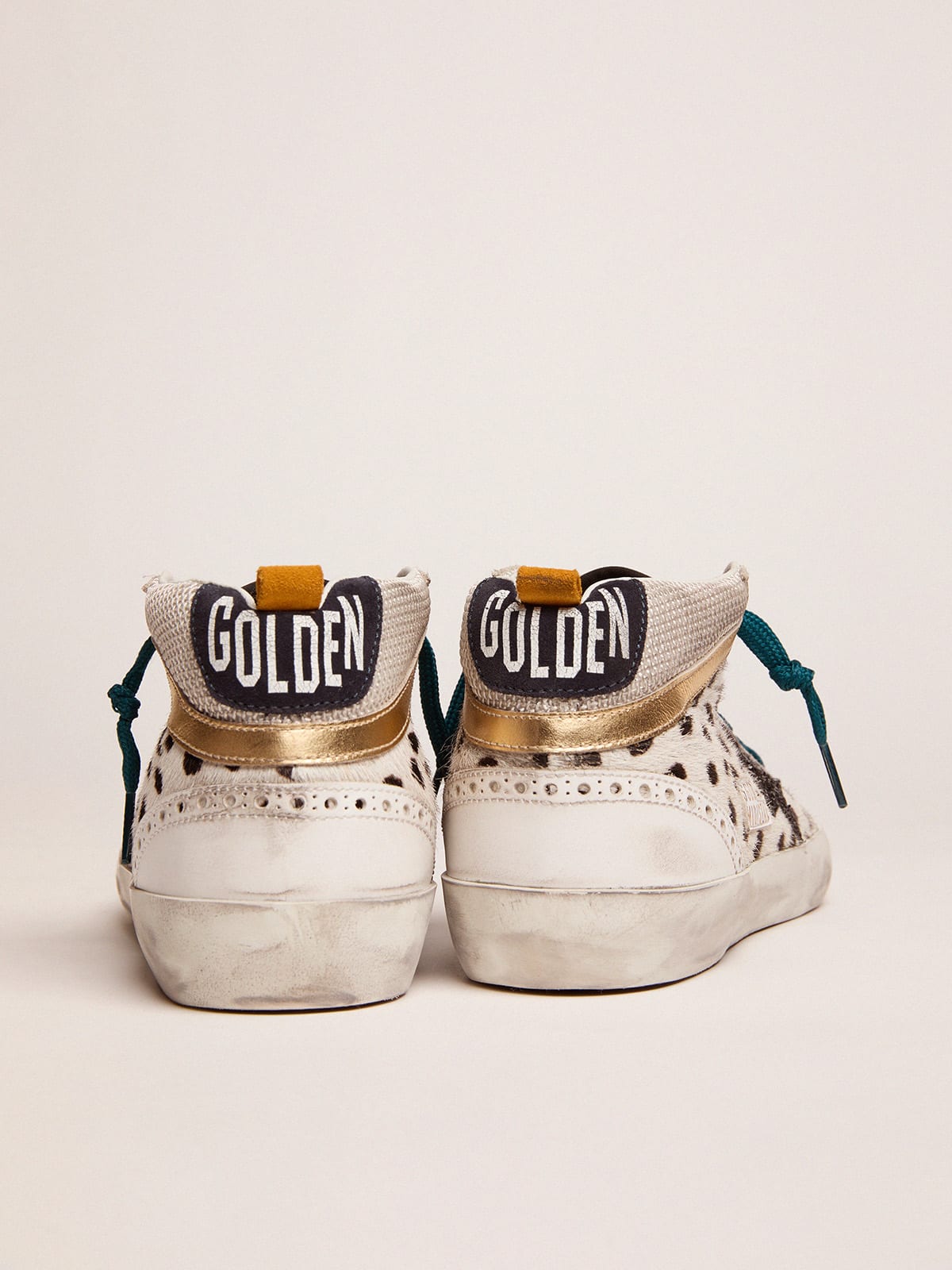 Mid Star sneakers with animal-print pony skin upper and glitter star |  Golden Goose