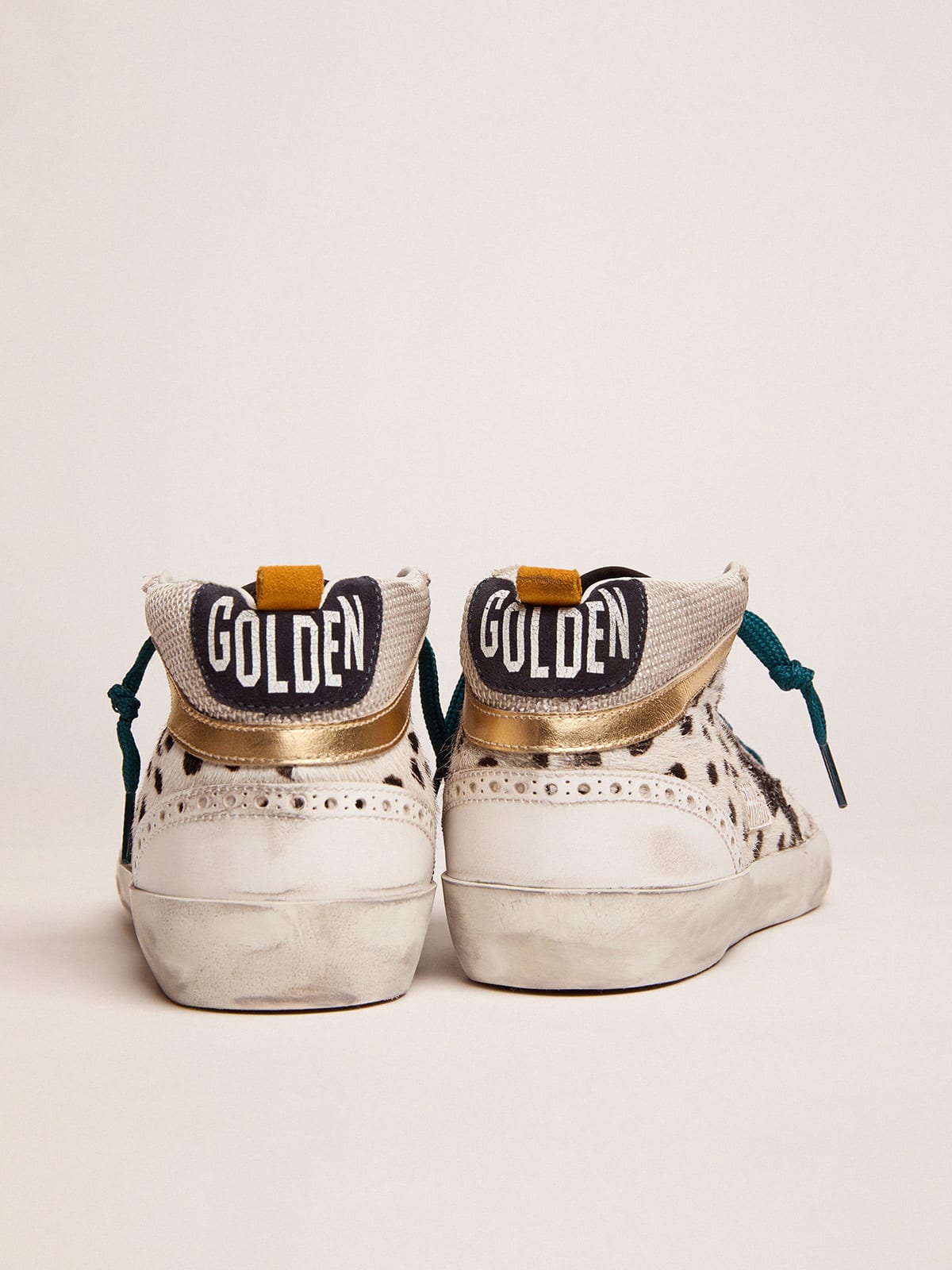 Golden goose mid star calf 2024 hair sneakers