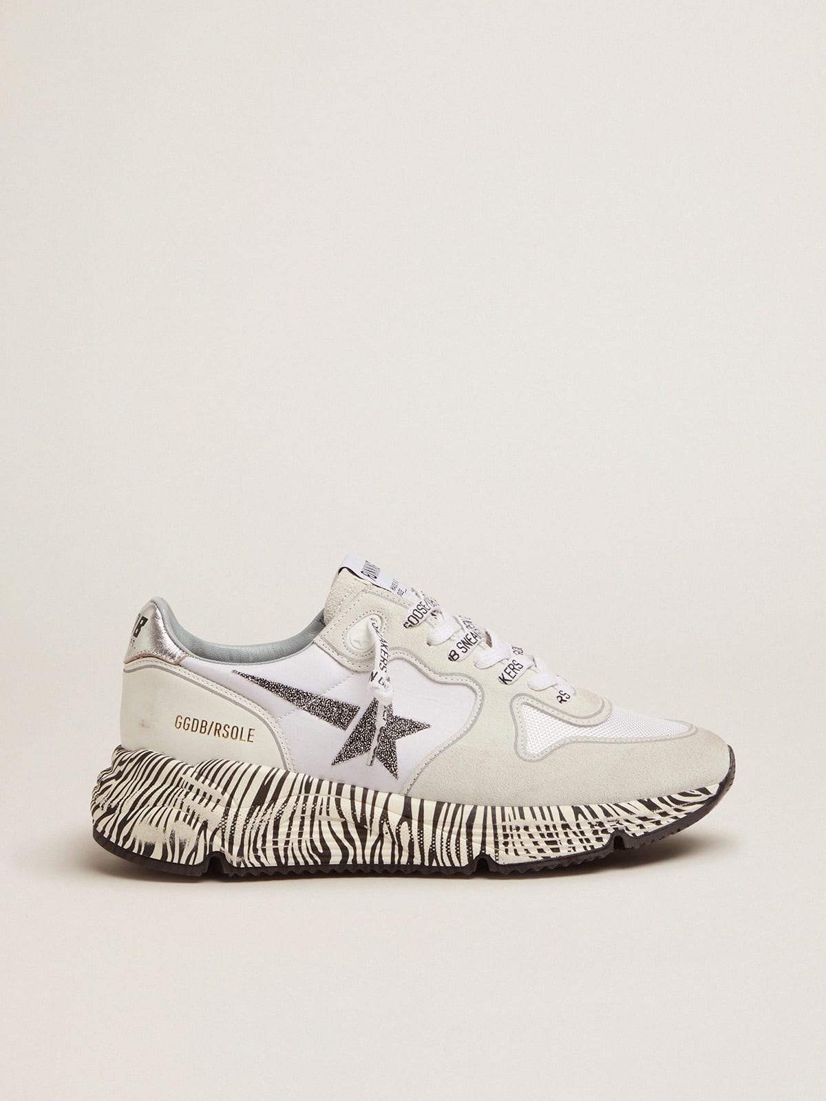 Running Sole sneakers with zebra print sole and crystals