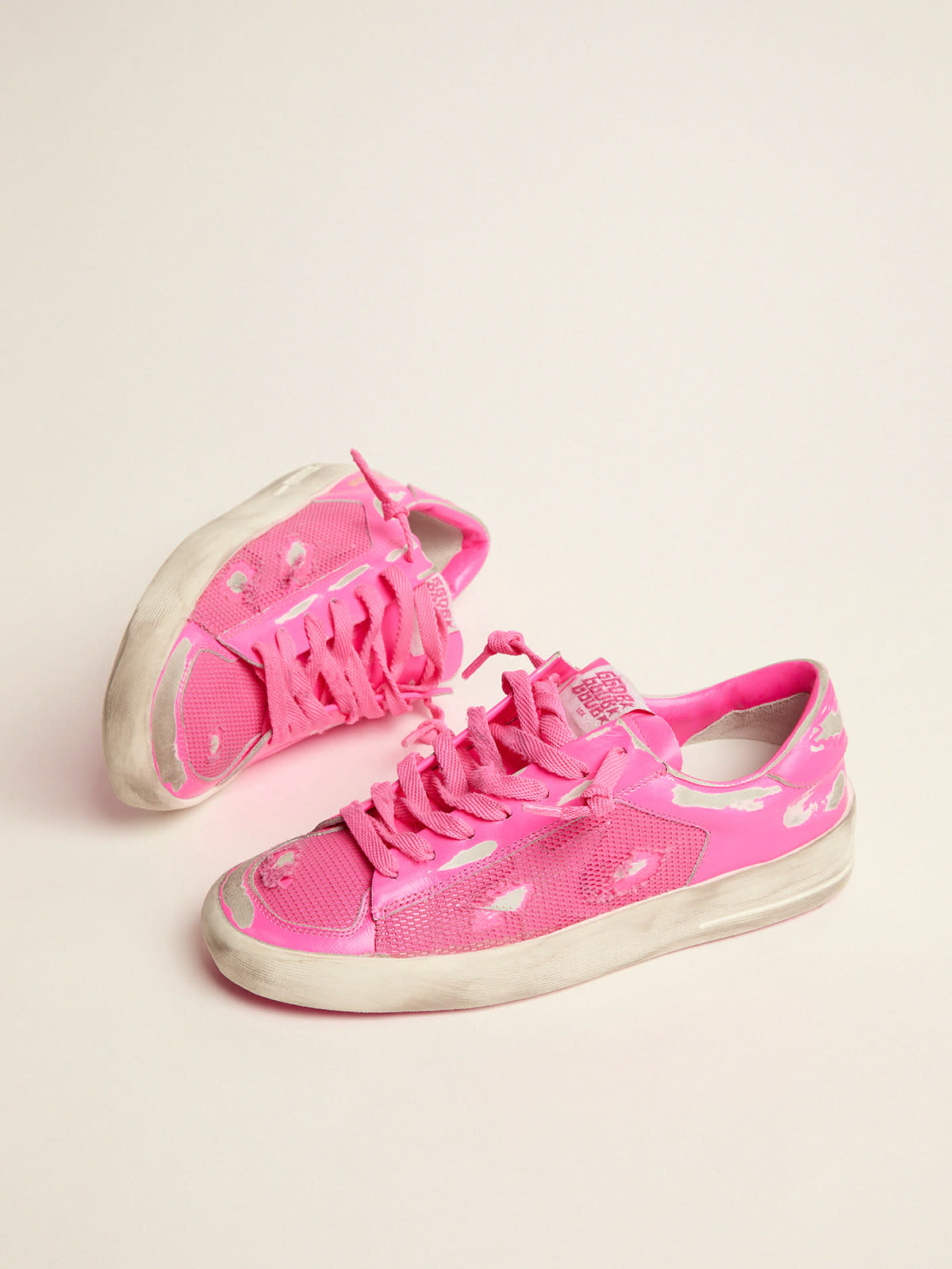 Women s Stardan sneakers in fluorescent pink leather and mesh