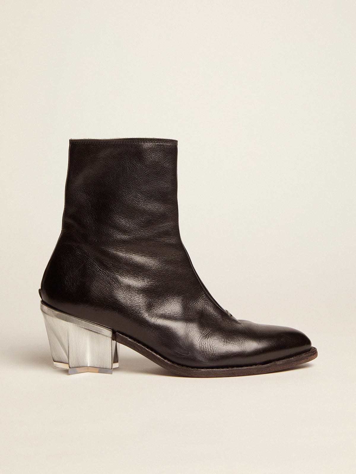 Star boots in black leather with sculptured heel with a metallic finish ...