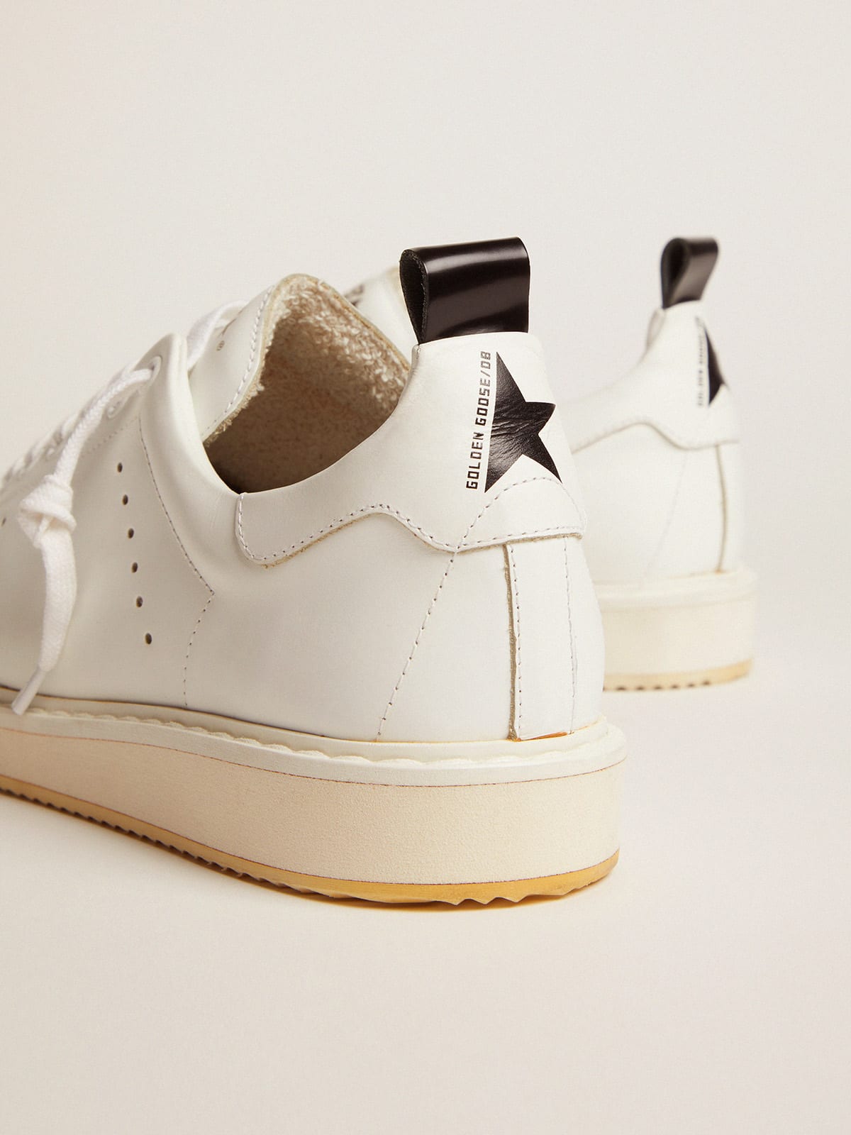 Starter sneakers in leather with printed star on the heel tab