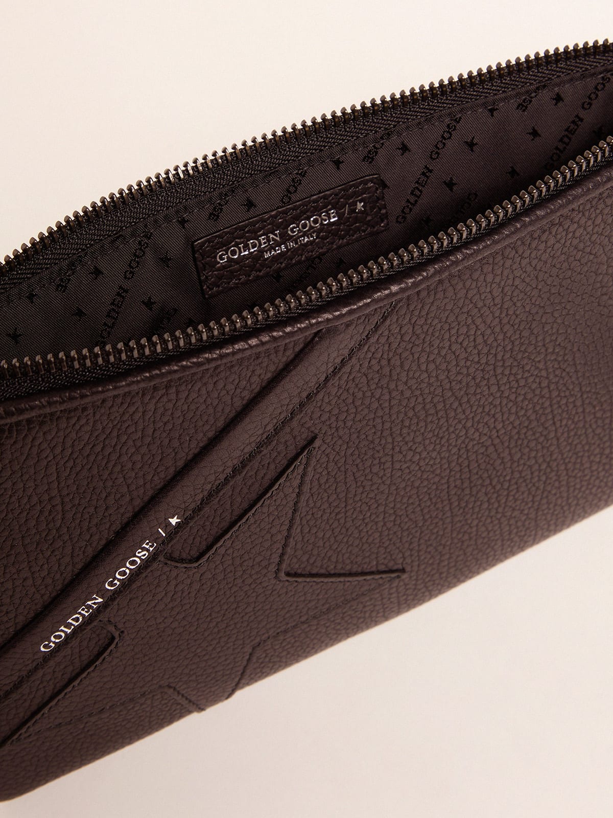 Black Star Wrist clutch bag in grained leather