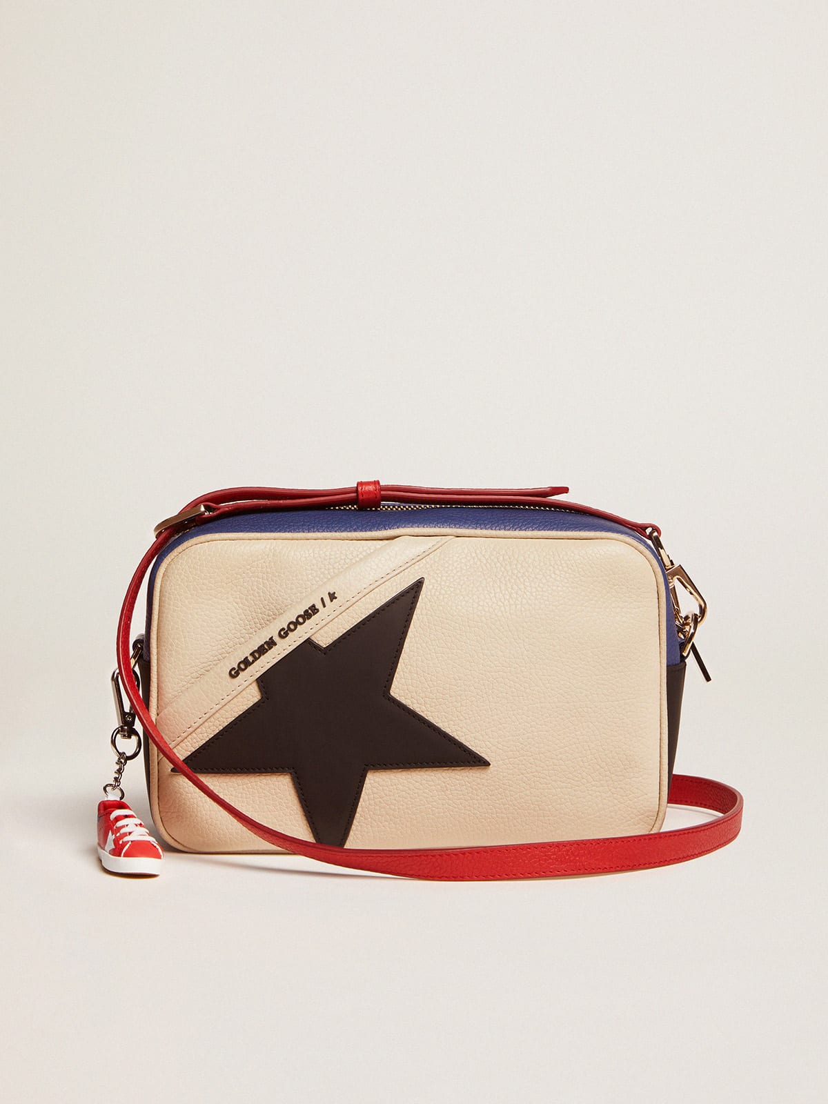 Women s Star Bag in pebbled leather with black star Golden Goose