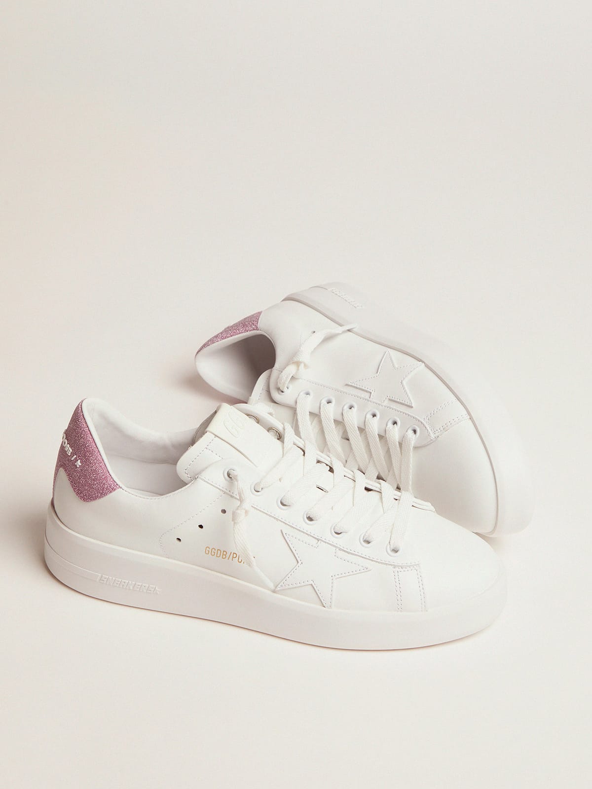 Purestar sneakers in white leather with pink glitter heel tab | Golden Goose