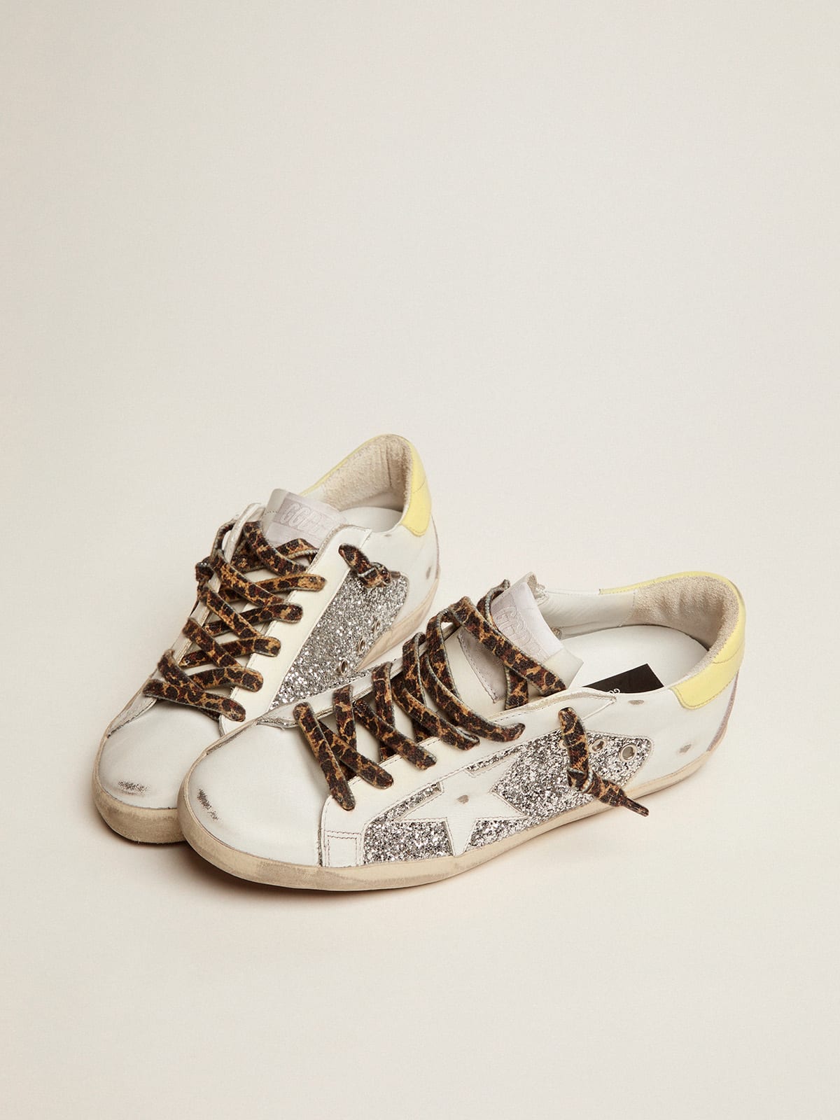 LTD Super-Star Sneakers in leather and glitter with colorful heel tab |  Golden Goose