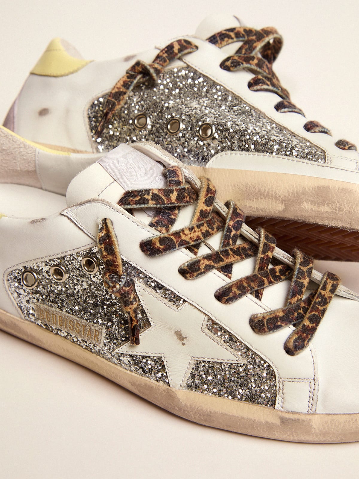 LTD Super-Star Sneakers in leather and glitter with colorful heel tab |  Golden Goose