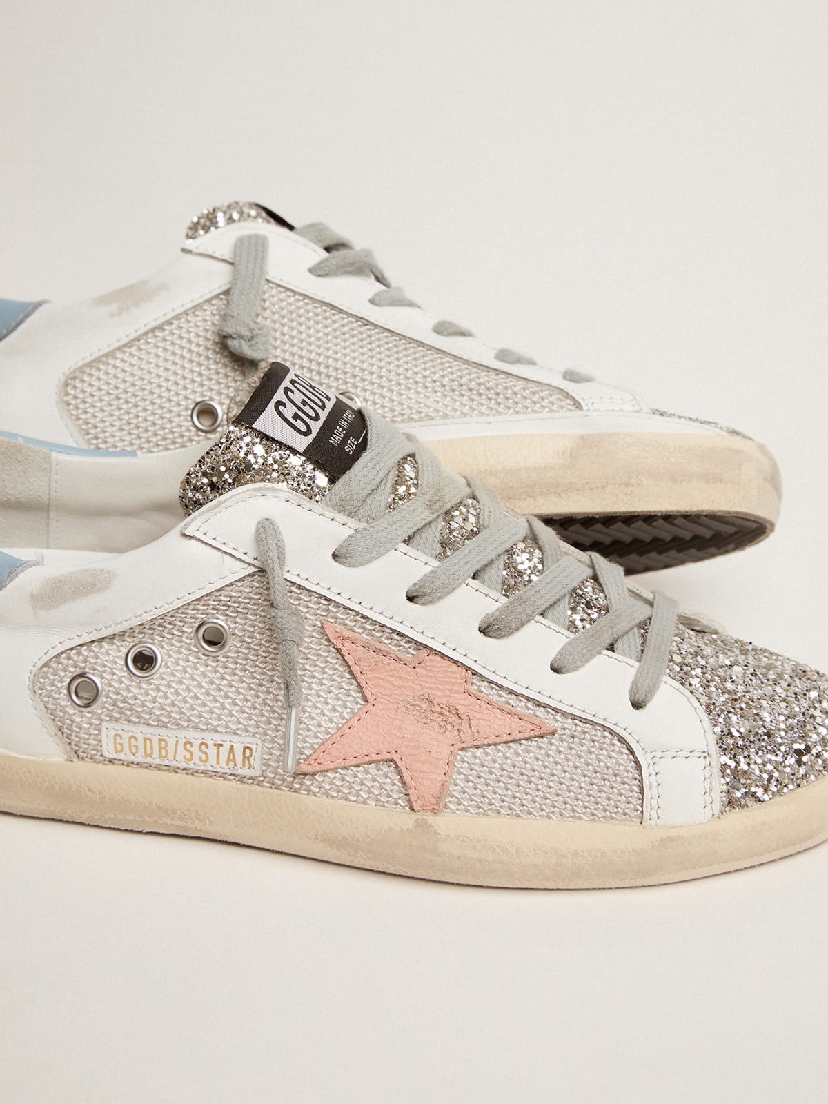 Super-Star LTD sneakers in white leather with mesh insert and silver  glitter tongue | Golden Goose