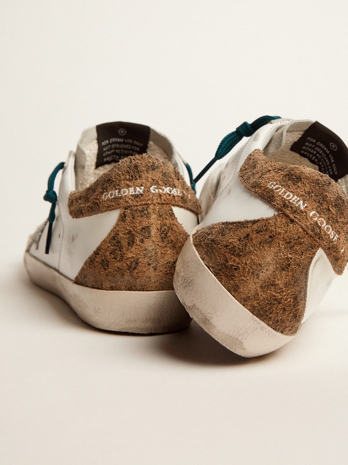 Super-Star sneakers with silver glitter star and leopard-print suede heel  tab | Golden Goose