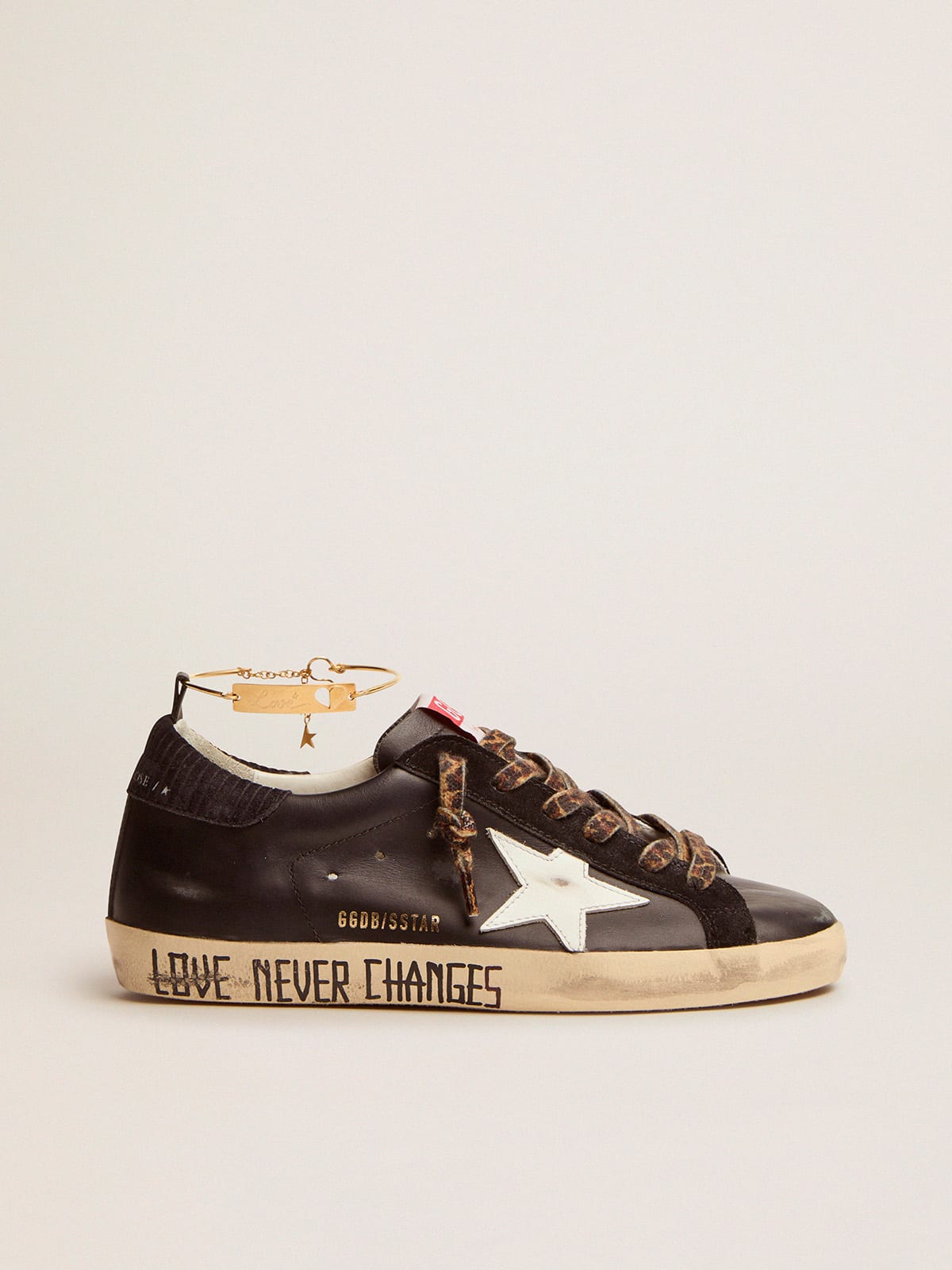 Golden goose black and best sale gold sneakers