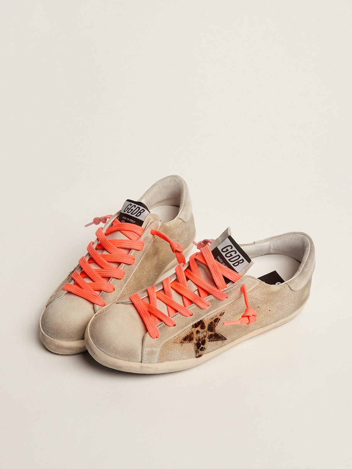 Gold-colored Super-Star sneakers with checkered pattern and handwriting |  Golden Goose