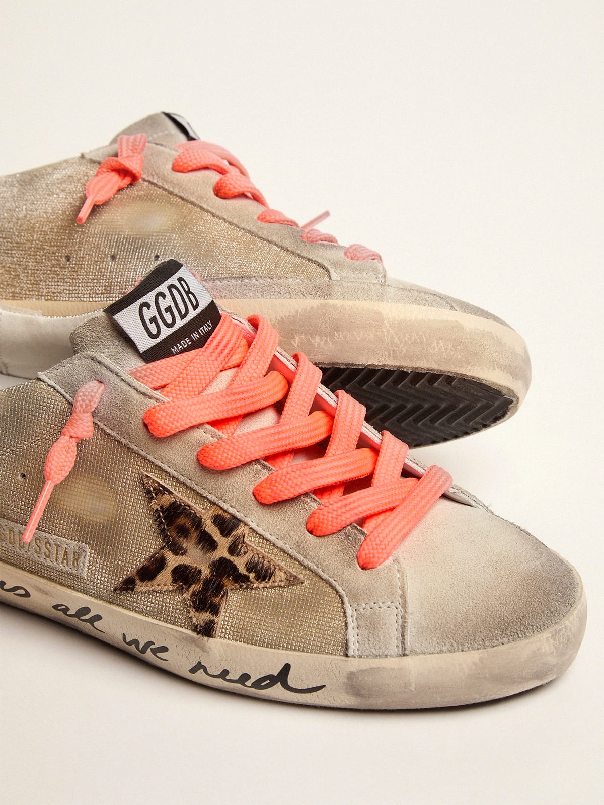 Gold-colored Super-Star sneakers with checkered pattern and handwriting |  Golden Goose