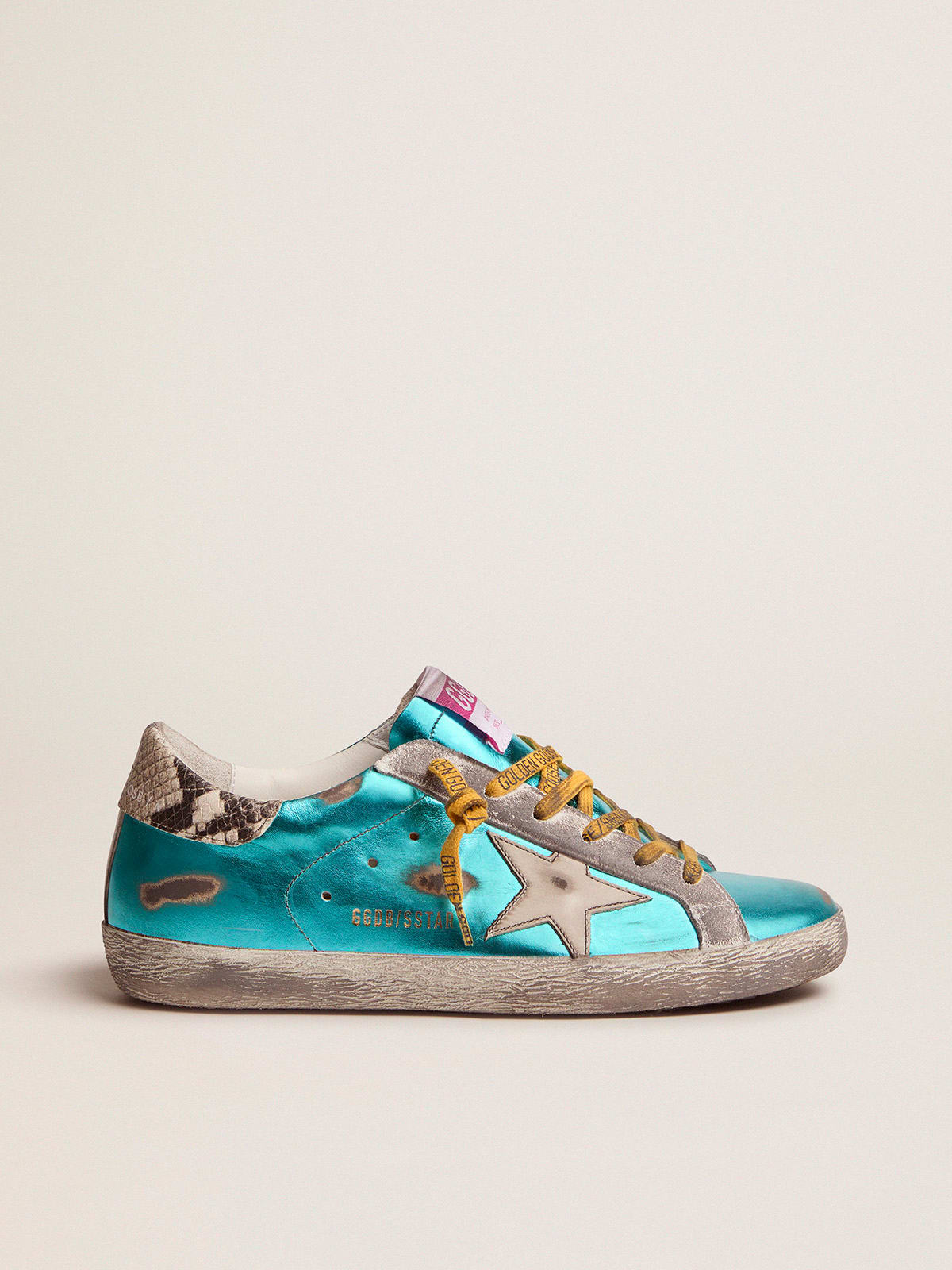 Turquoise green laminated Super-Star LTD sneakers with snake-print heel tab  | Golden Goose