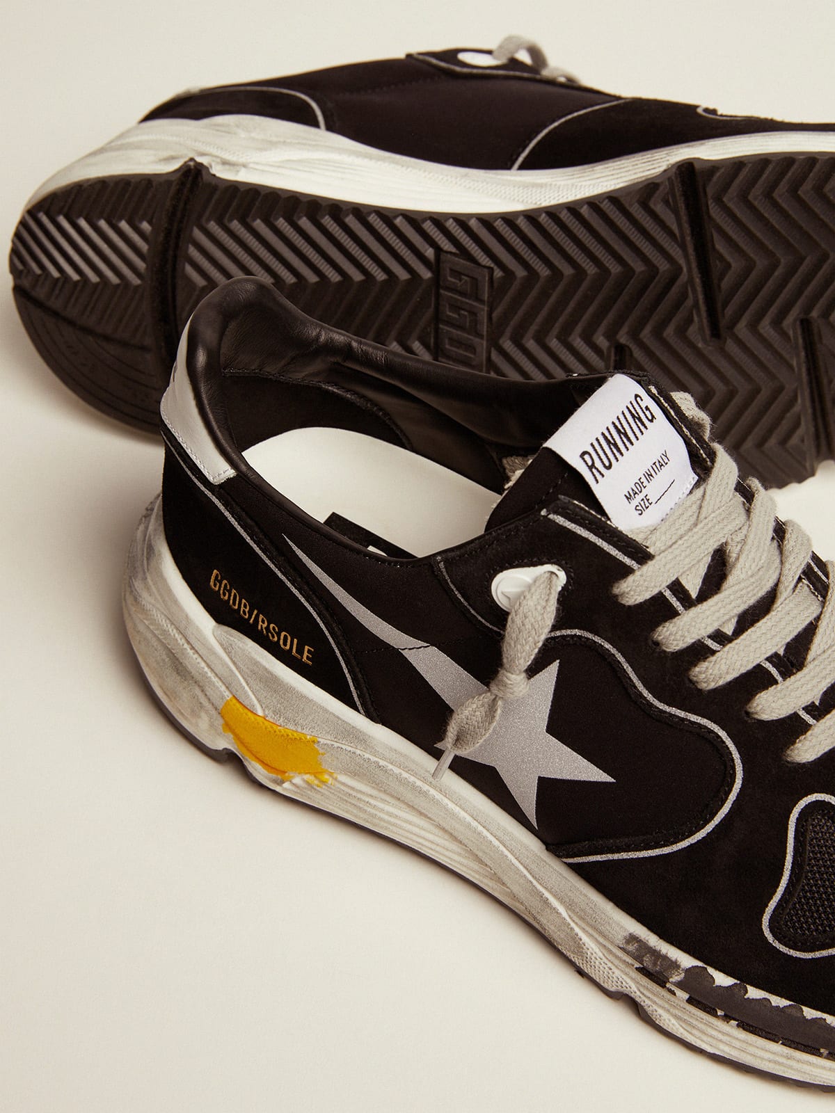 Men’s black Running Sole sneakers with silver star