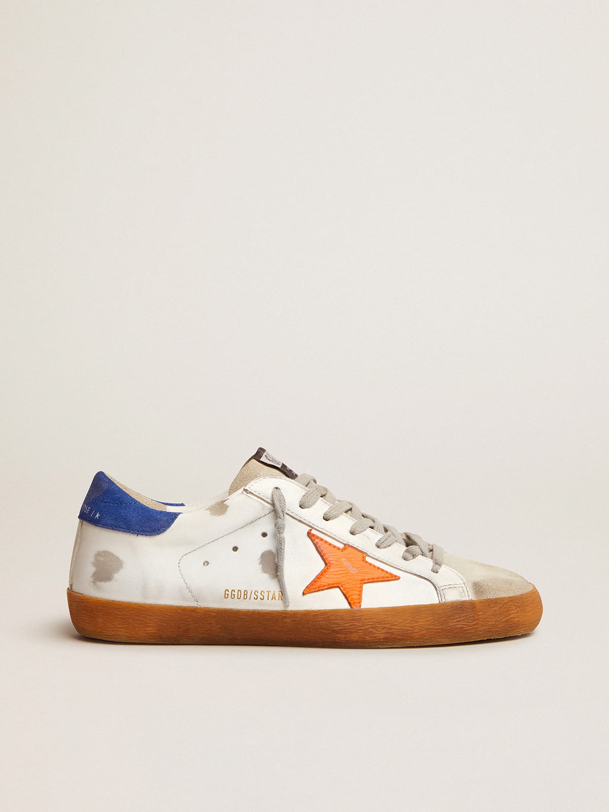 Super-Star sneakers with blue suede heel tab and neon orange star | Golden  Goose