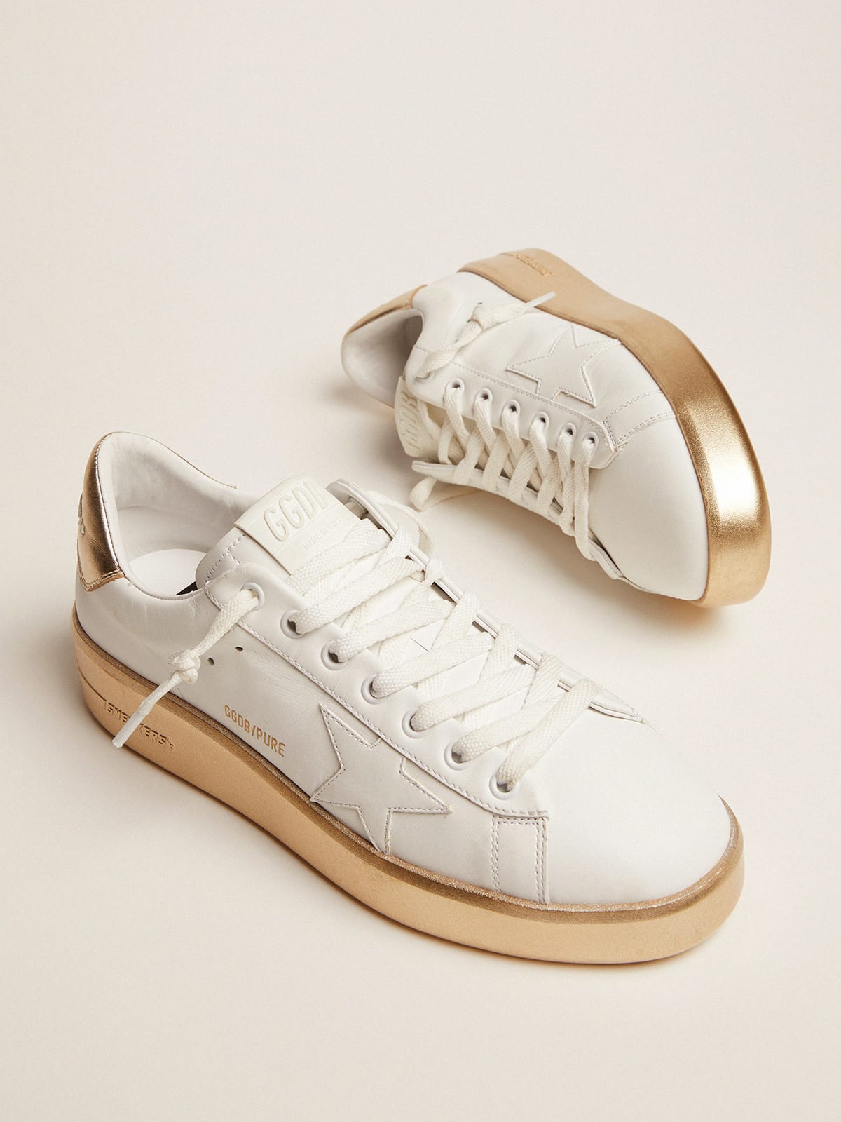 Purestar sneakers in leather with foxing and gold laminated leather heel tab  | Golden Goose