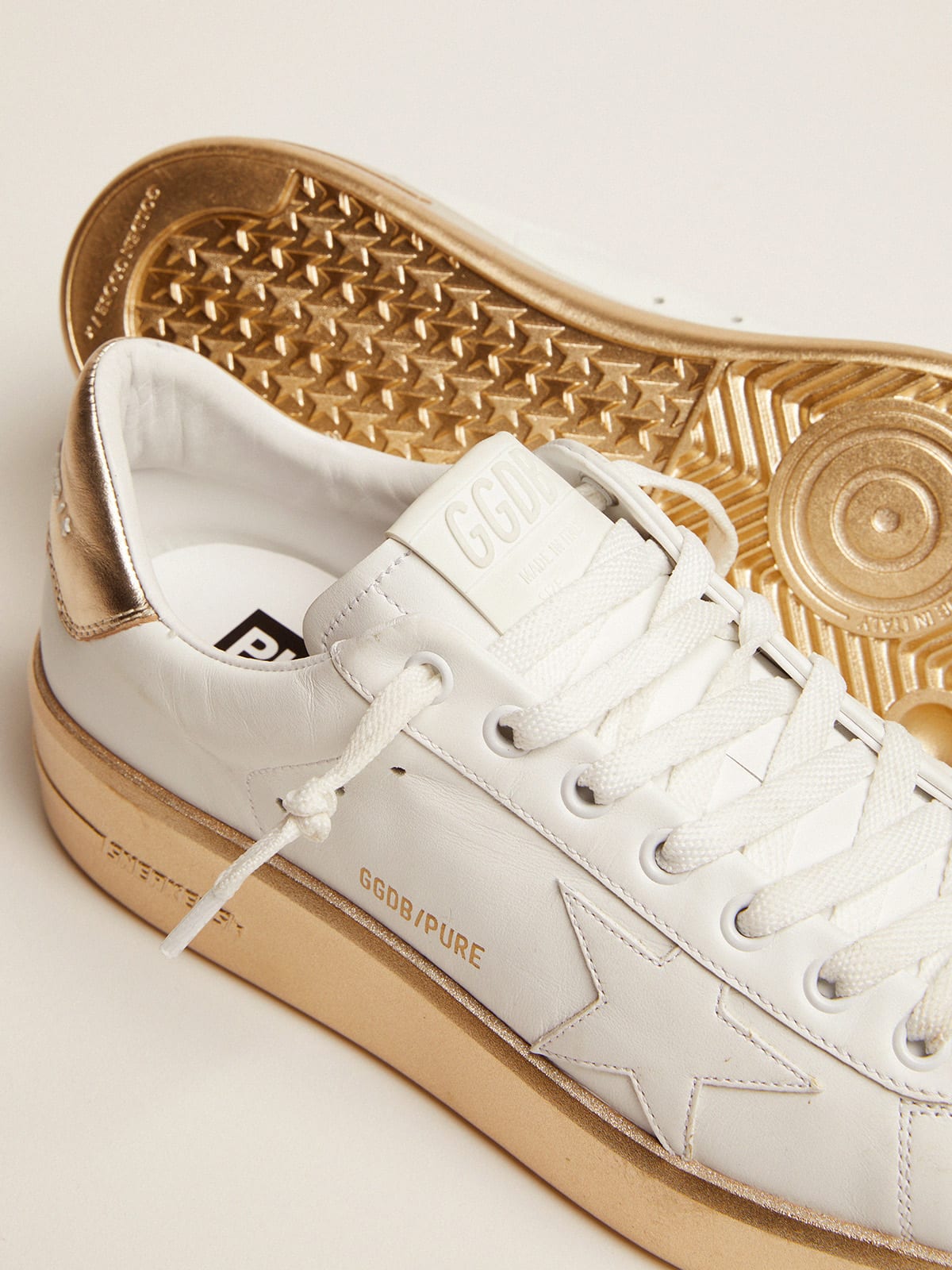 Purestar sneakers in leather with foxing and gold laminated leather heel tab  | Golden Goose