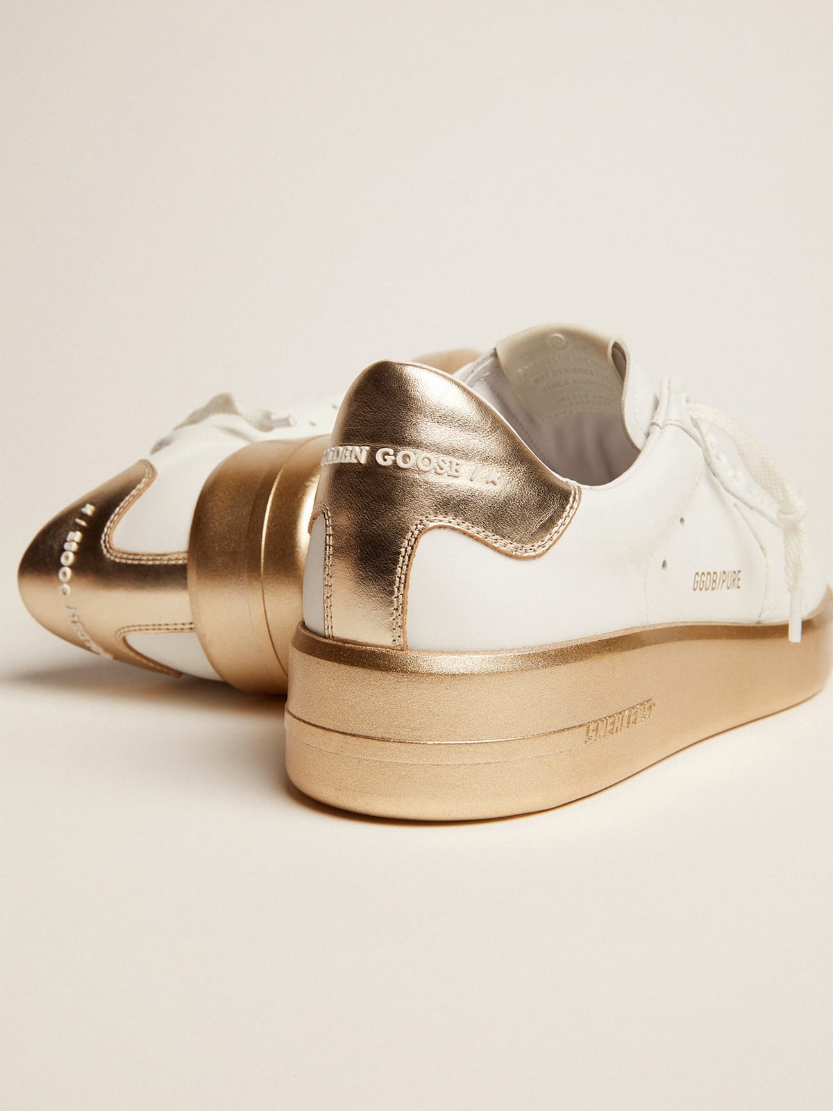 Purestar sneakers in leather with foxing and gold laminated leather heel tab  | Golden Goose