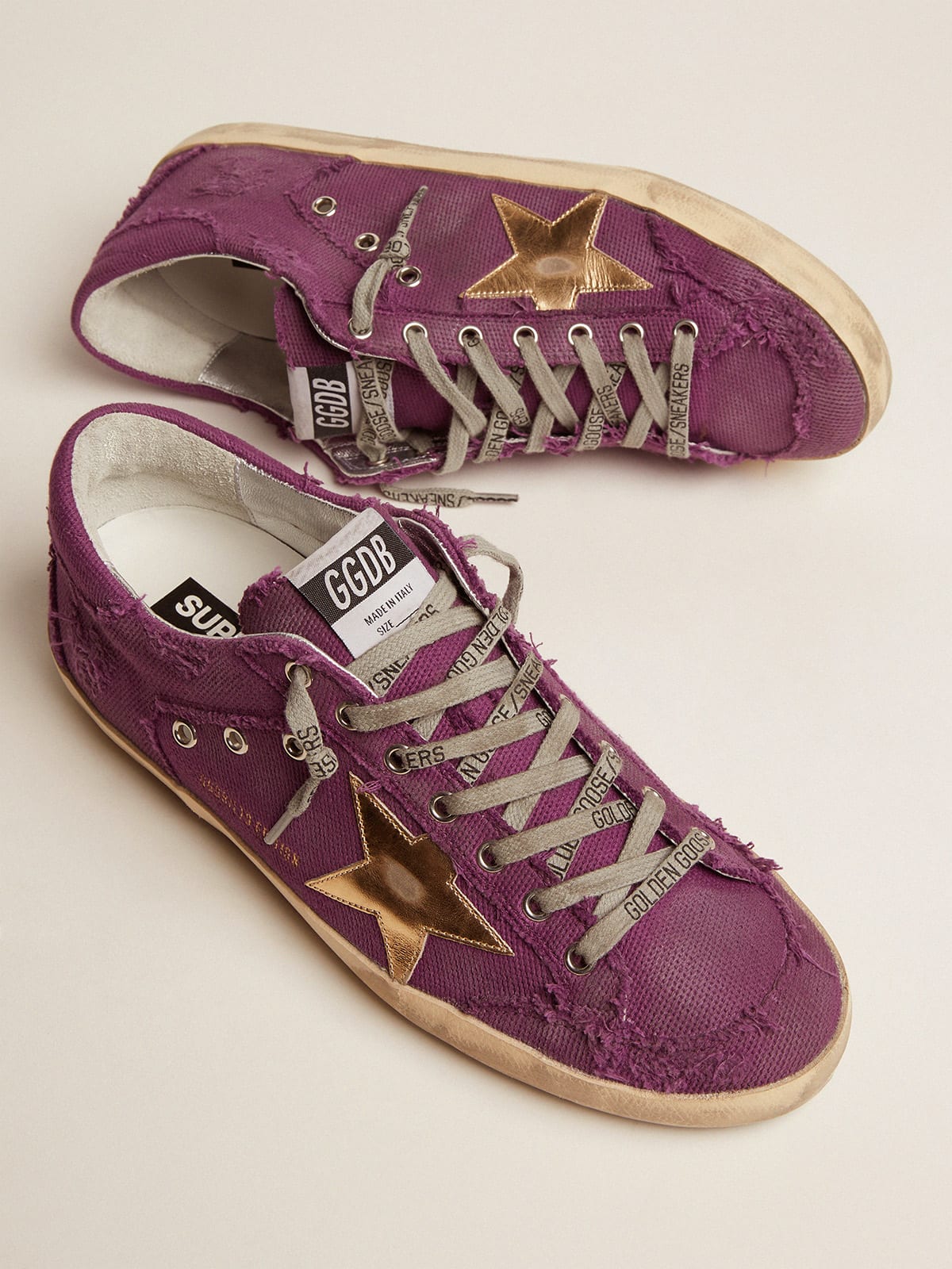 Women\'s Super-Star LAB sneakers in purple distressed canvas with gold star  | Golden Goose