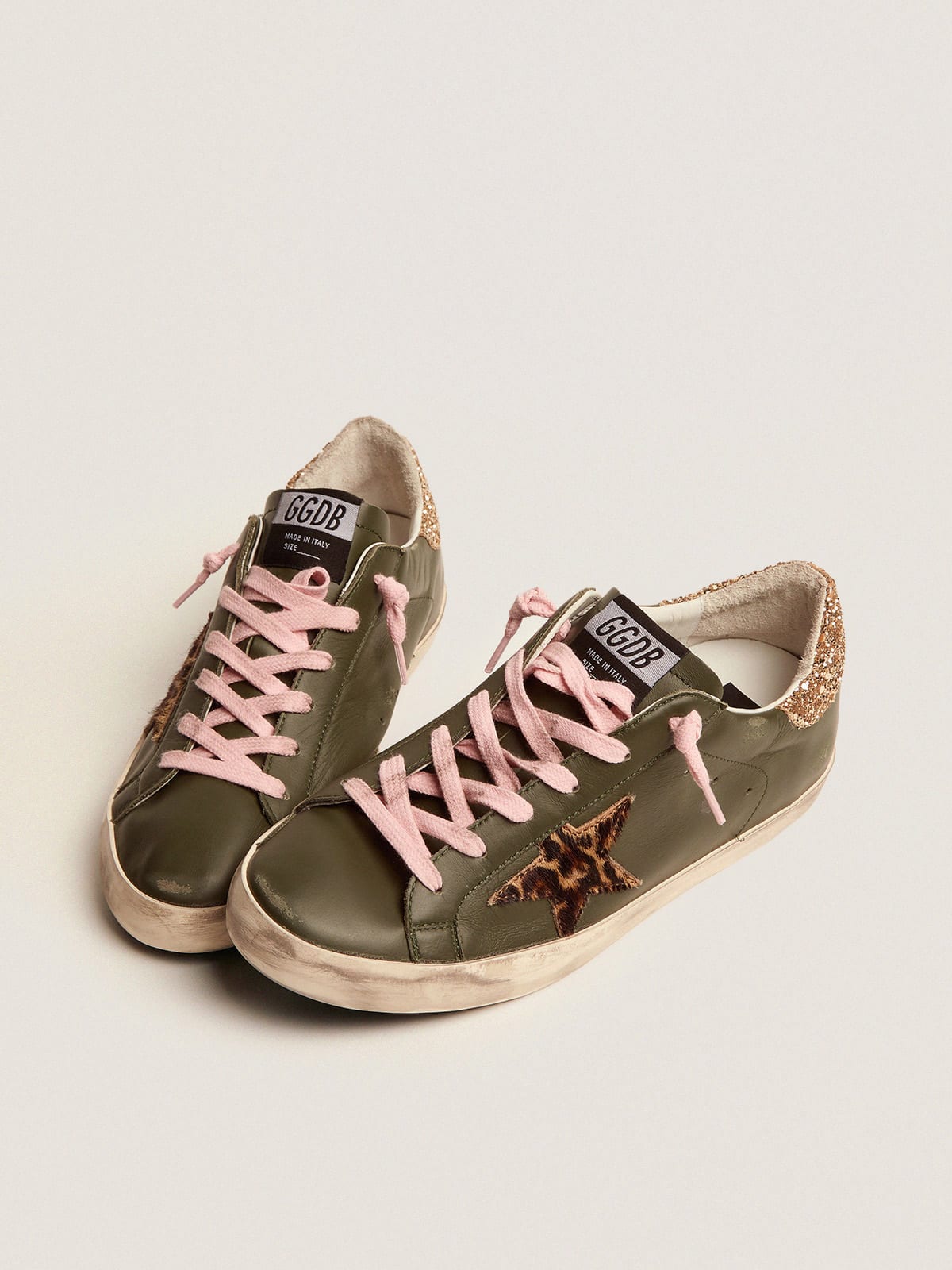 Super-Star sneakers in dark green leather with gold glitter heel tab |  Golden Goose